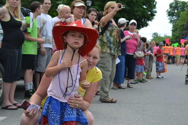 child watching parade